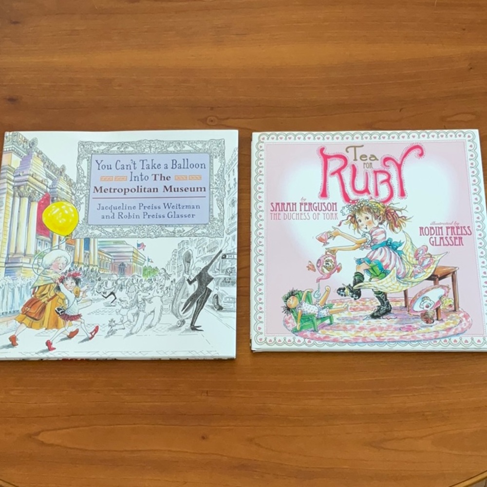 Books signed by illustrator Robin Preiss Glasser